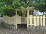 Picket fence incorporating an entrance arbor